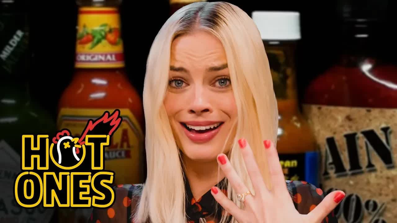 Margot Robbie Pushes Her Limits While Eating Spicy Wings
